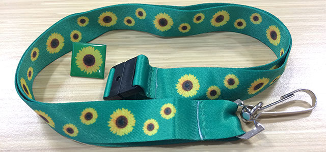 A lanyard printed with a yellow sunflower, designed to be worn by people with hidden disabilities.
